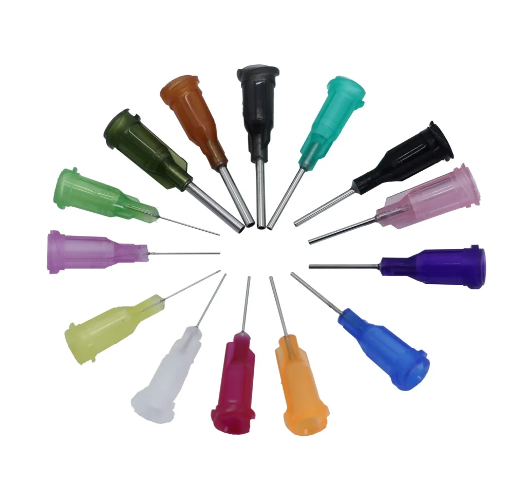 Blunt-tip dispensing needle with a rounded end to protect sensitive substrates during adhesive application