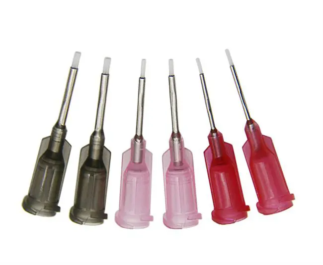 PTFE-lined stainless steel dispensing tip that prevents clogging and chemical reactions when applying cyanoacrylate or reactive adhesives